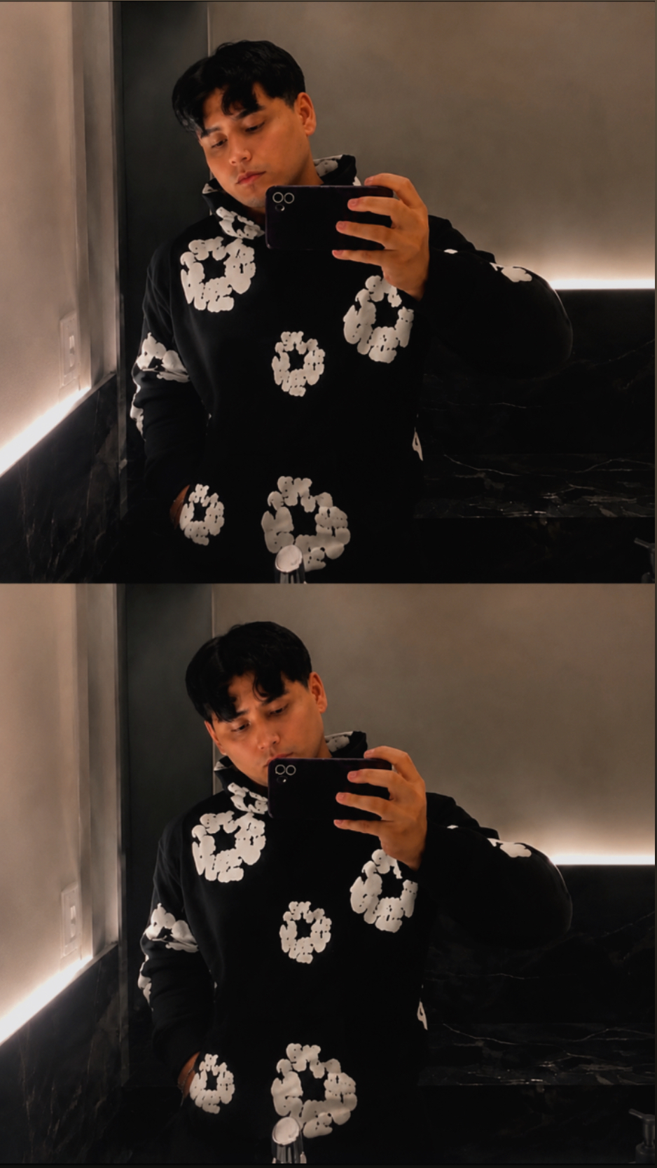 Foto no espelho com moletom preto estampado, em clima mais casual.